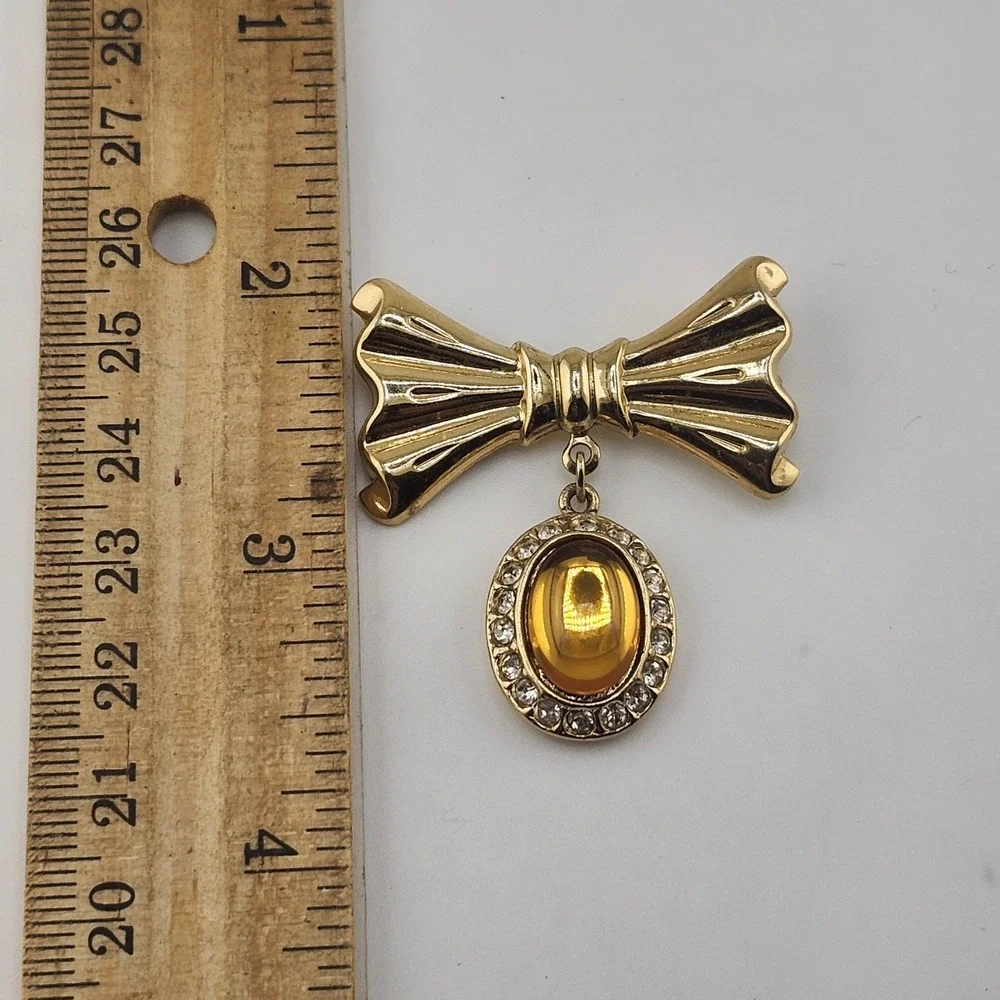 Vintage Gold Tone Bow With Amber Color Dangle Brooch‎ Pin